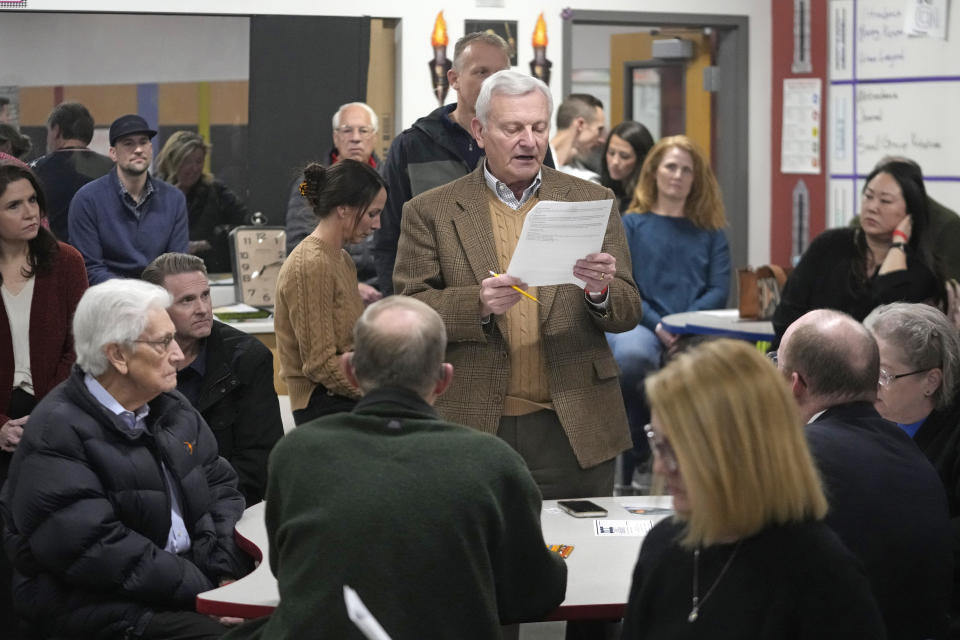 Dennis Peterson speaks during the Republican caucus at the Millcreek Junior High School Tuesday, March 5, 2024, in Bountiful, Utah. (AP Photo/Rick Bowmer)