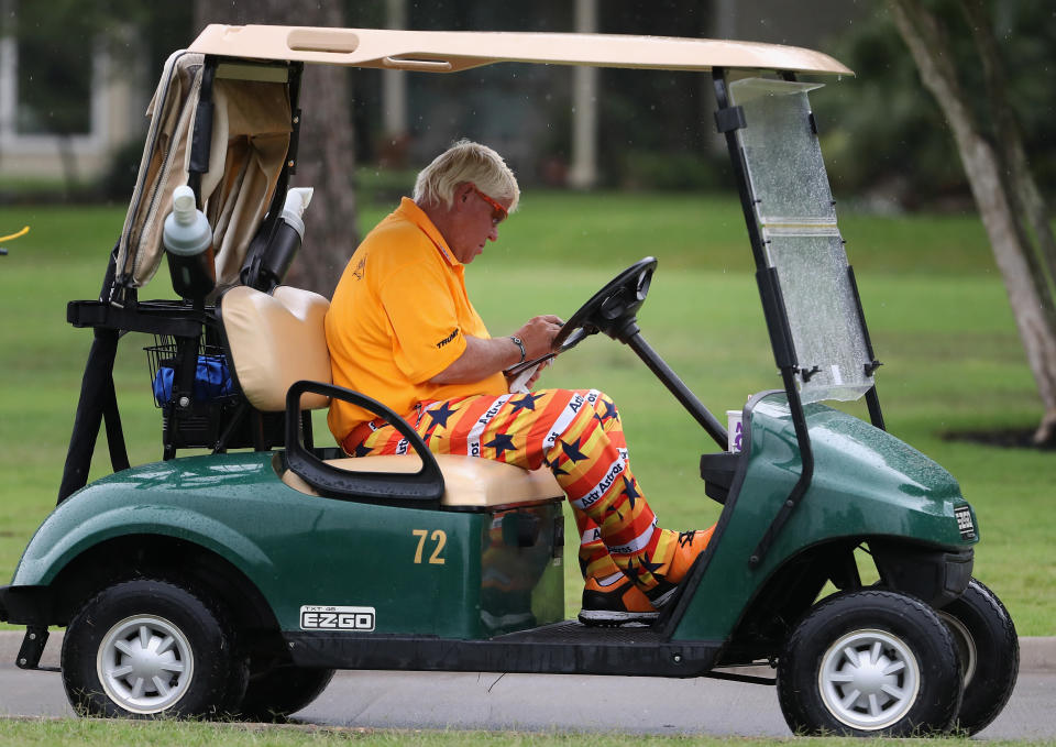 John Daly, 53, is being allowed to use a cart with no roof because of arthritis in his right knee. (Getty)