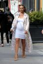 <p>Chrissy Teigen took cues from her good friend Kim and filled her maternity wardrobe with body-hugging dresses and lightweight duster jackets.</p>