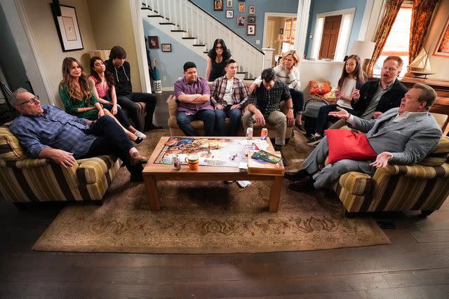 <p>Eric McCandless via Getty</p> The 'Modern Family' cast during part one of the series finale