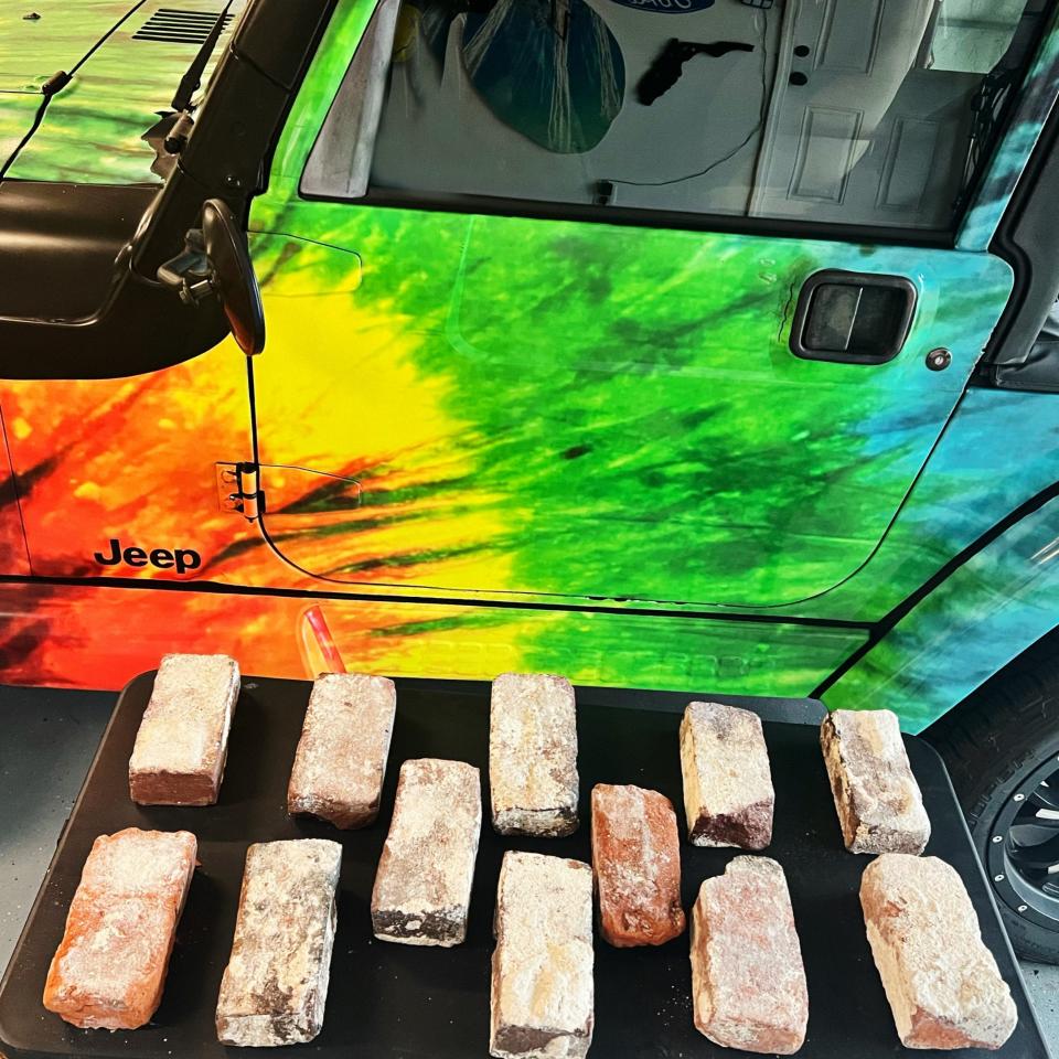 Jason Garrison is storing the bricks he said he found on Sanibel's Lighthouse Beach in his garage. He said the bricks are from the two historic keeper's cottages that were destroyed during Hurricane Ian on Sept. 28, 2022.
