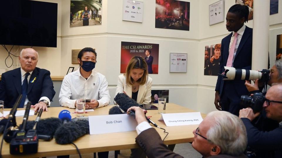 Hong Kong protestor Bob Chan (C) speaks during a press conference, next to Conservative MP Sir Iain Duncan Smith (L), at the Centre for Social Justice in London, Britain, 19 October 2022.