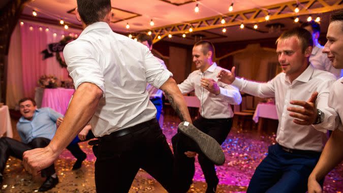 Groomsmen at wedding banquet