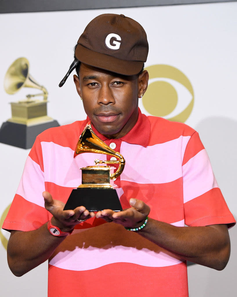 tyler holding his grammy