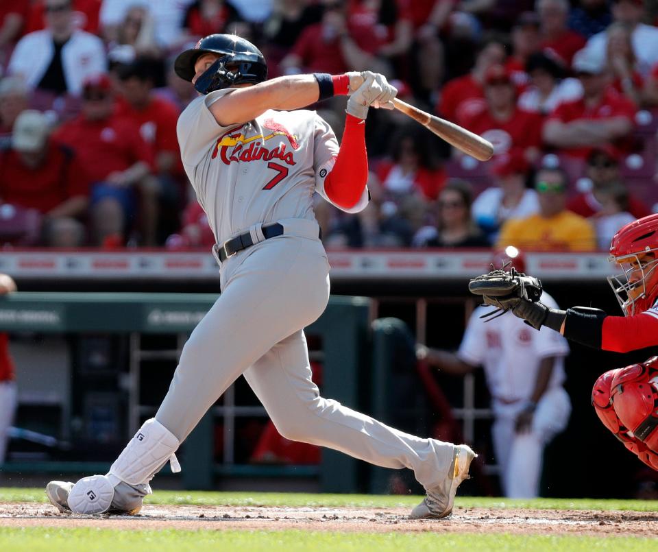 Apr 23, 2022; Cincinnati, Ohio, USA; St. Louis Cardinals catcher Andrew Knizner (7) hits an RBI single against the Cincinnati Reds during the second inning at Great American Ball Park. Mandatory Credit: David Kohl-USA TODAY Sports