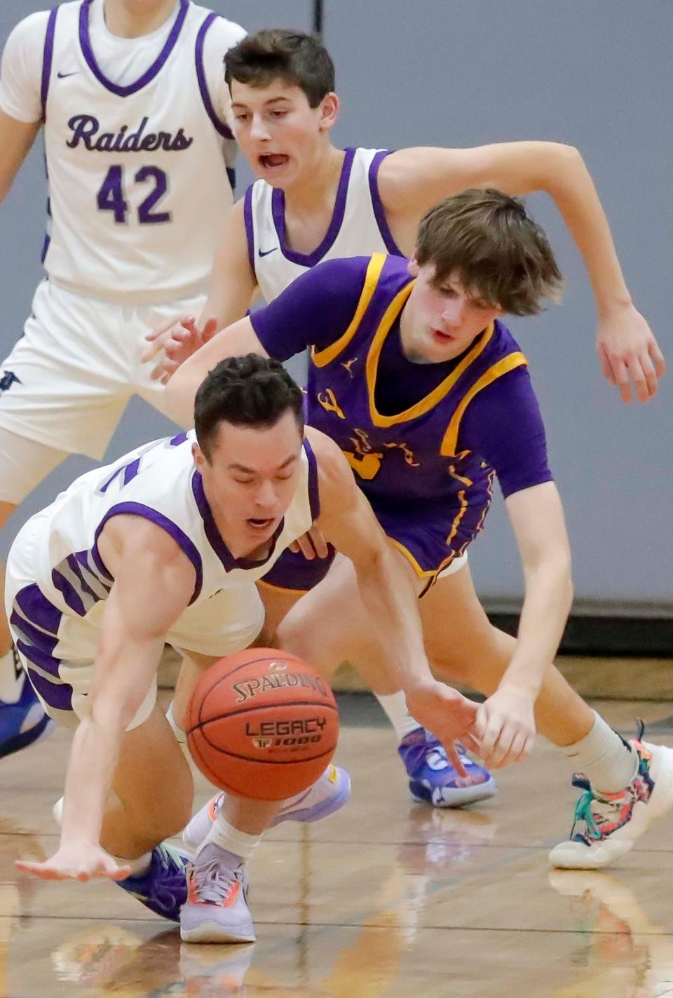 Kiel's Pierce Arenz, front, is one of the 14 boys basketball players to watch this season across Manitowoc and Sheboygan counties.