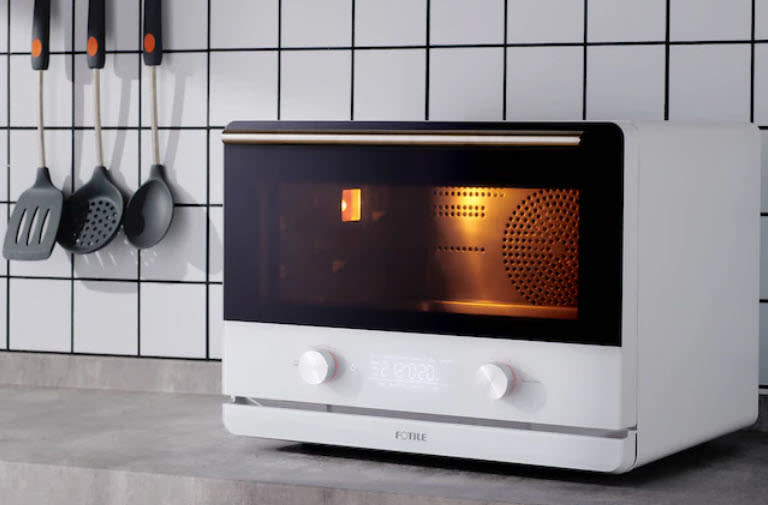 white toaster oven/air fryer on kitchen counter