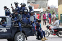 Police sit in a pickup vehicle in front of Notre Dame Cathedral in Kinshasa, Democratic Republic of Congo, February 25, 2018. REUTERS/Goran Tomasevic