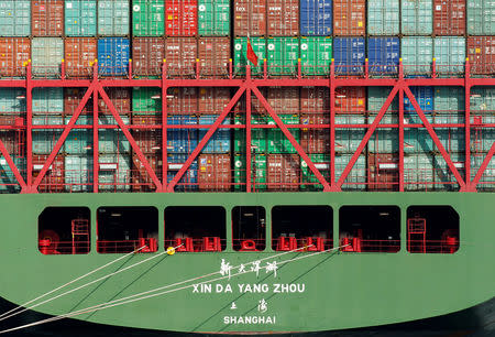 FILE PHOTO: China Shipping containers sit on a ship in the Port of Los Angeles after being imported to the U.S., California, October 7, 2010. REUTERS/Lucy Nicholson/File Photo