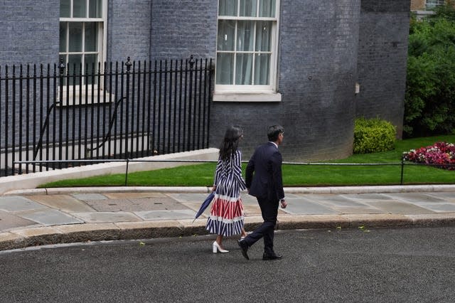 Outgoing Conservative Prime Minister Rishi Sunak and his wife Akshata Murty leave Downing Street, London. 
