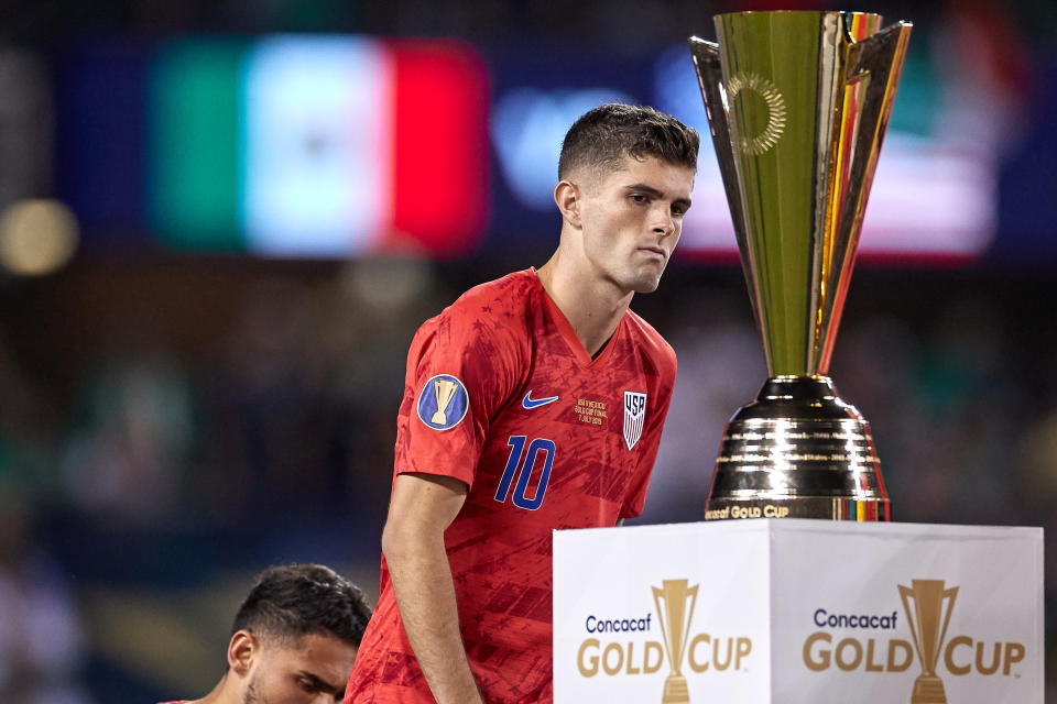 CHICAGO, IL - JULY 07: United States midfielder Christian Pulisic (10) stares at the 2019 Gold Cup Trophy after the CONCACAF Gold Cup final match between the United States and Mexico on July 07, 2019, at Soldier Field in Chicago, IL. (Photo by Robin Alam/Icon Sportswire via Getty Images)