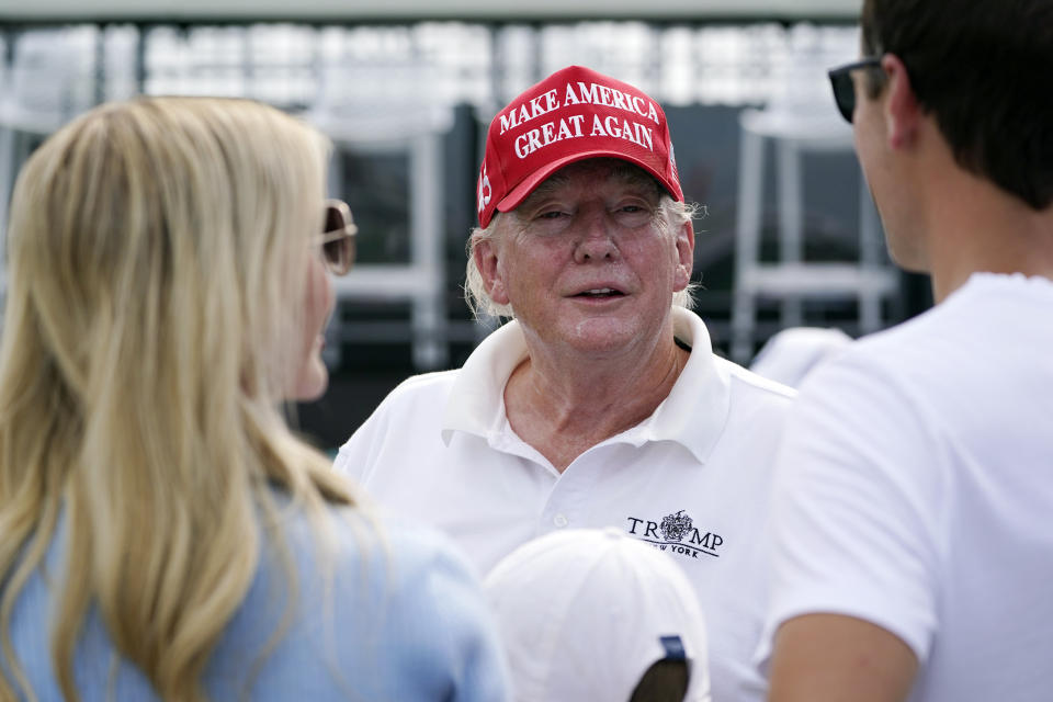 Former President Donald Trump arrives for the pro-am at the Bedminster Invitational LIV Golf tournament in Bedminster, NJ., Thursday, July 28, 2022. (AP Photo/Seth Wenig)