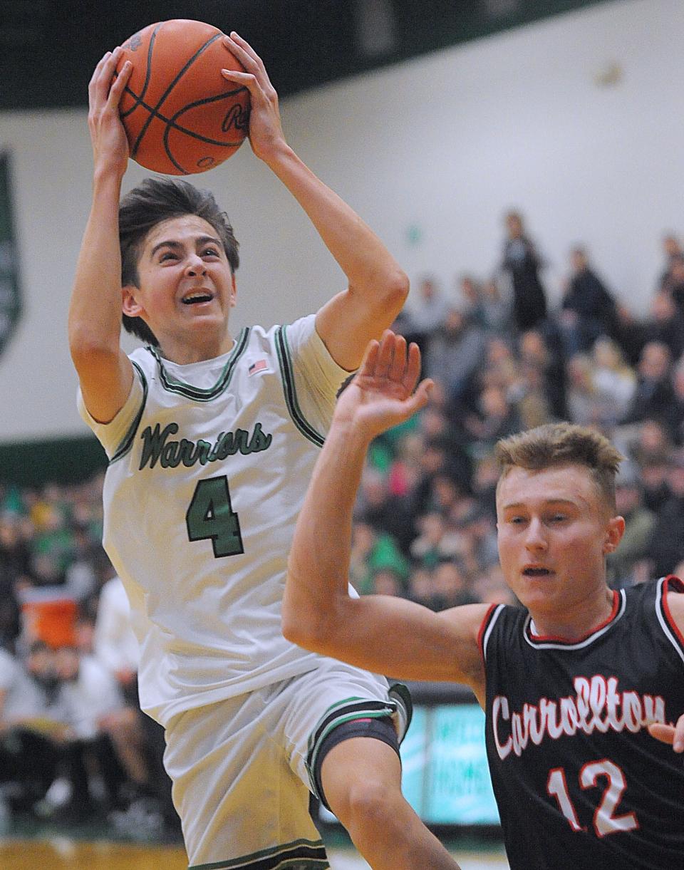 West Branch's Jaxon Robb pulls up for a shot in a Eastern Buckeye Conference game against Carrollton at the West Branch Field House Tuesday, January 31, 2023.