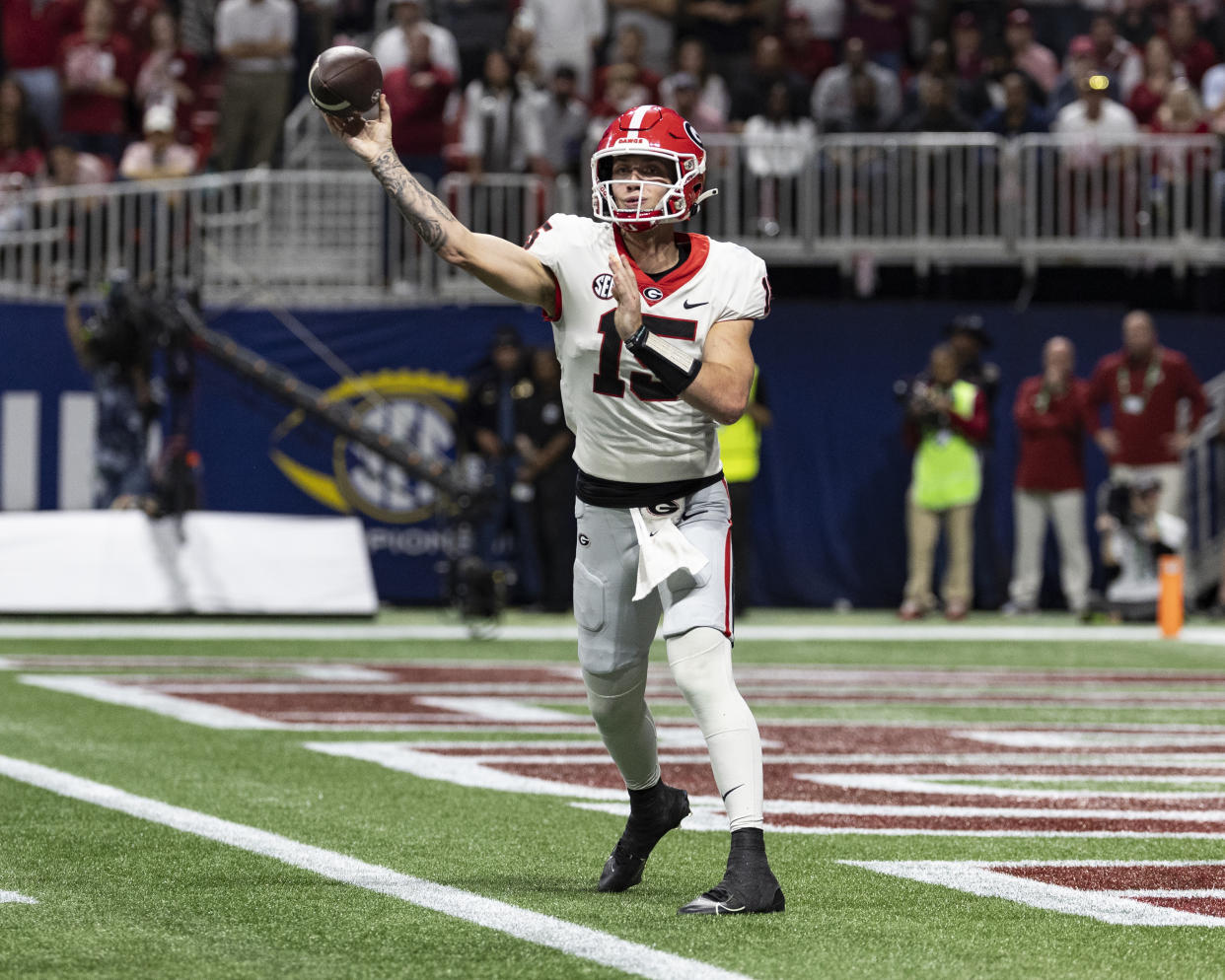 Carson Beck threw for more than 3,700 yards and completed better than 74% of his passes with the Bulldogs last season