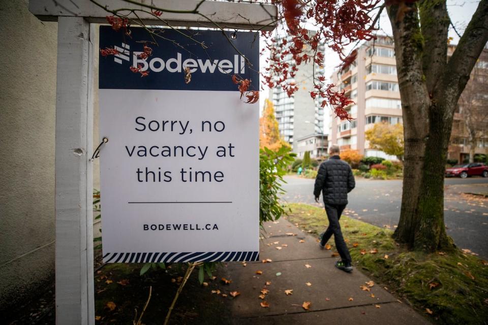 A rental availability sign showing no vacancy is pictured outside of an apartment building in Vancouver, British Columbia on Monday, November 21, 2022. 