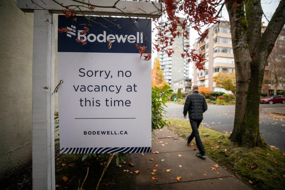 A rental availability sign showing no vacancy is pictured outside of an apartment building in Vancouver, British Columbia on Monday, November 21, 2022.