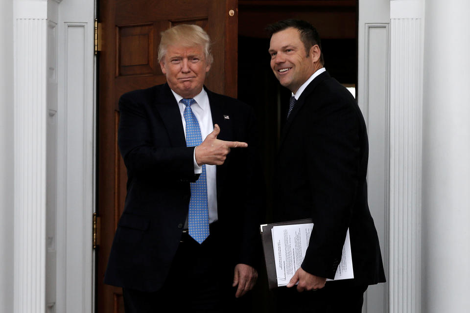 President-elect Donald Trump with Kansas Secretary of State Kris Kobach before a meeting in Bedminster, N.J., on Nov. 20, 2016. (Photo: Mike Segar/Reuters)