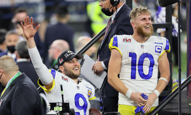 Los Angeles Rams wide receiver Cooper Kupp waves to fans at Rams