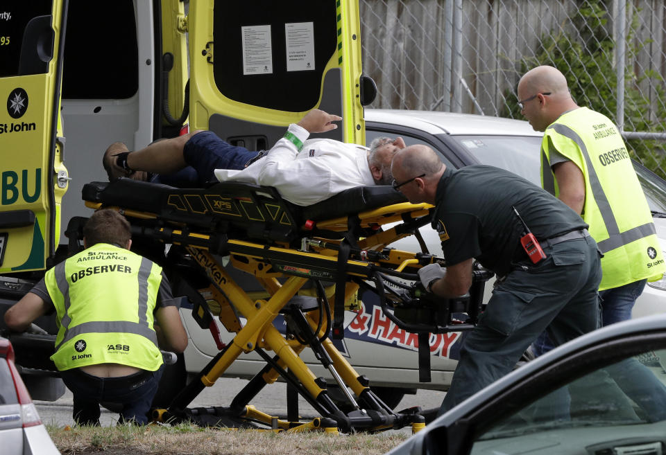 Ambulance staff take a man from outside a mosque in central Christchurch, New Zealand, on March 15, 2019.