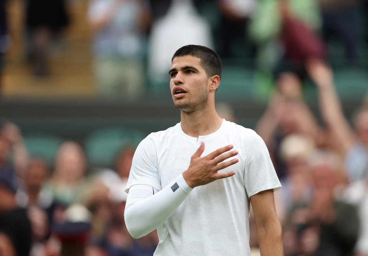 Tennis - Wimbledon - All England Lawn Tennis and Croquet Club, London, Britain - June 27, 2022 Spain's Carlos Alcaraz celebrates after winning his first round match against Germany's Jan-Lennard Struff REUTERS/Matthew Childs