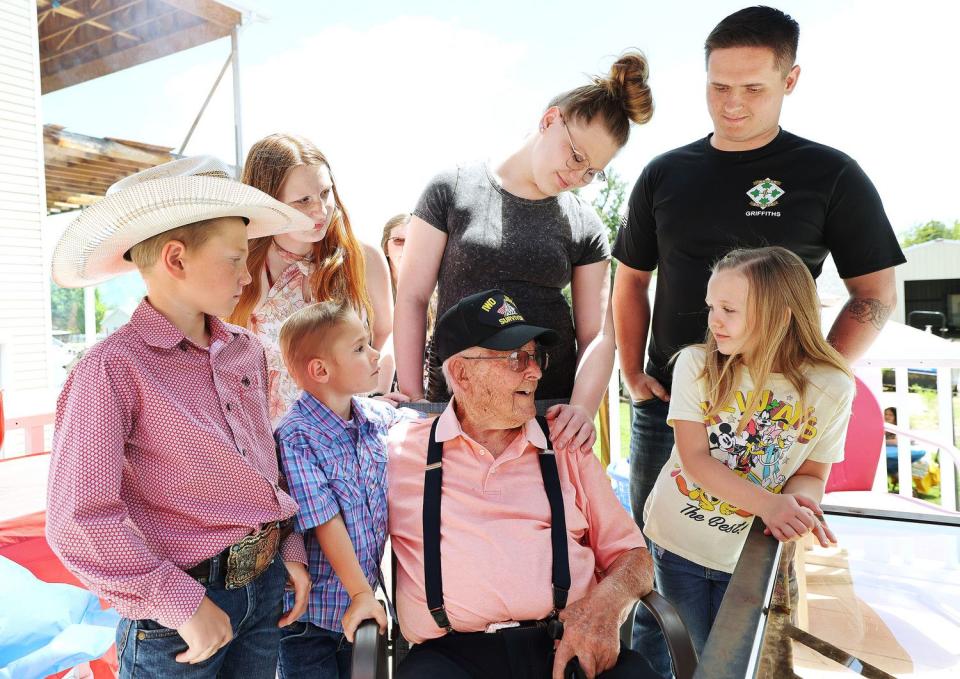 James Kimose, Farr West, talks with his great-great grandchildren as he celebrates his 101st birthday in Ogden on Sunday. Kimose is a WWII marine veteran and fought at Iwo Jima.