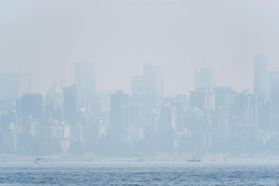 <p>This photo shows the Vancouver skyline under heavy haze as seen from Jericho Beach on August 21, 2018. Thick smoke blanketed Vancouver on Aug. 21, triggering warnings about dangerous particulate matter in the air and comparisons with cities in China and India ranked by the WTO as the worst polluted. It blew in from hundreds of wildfires burning across Canada’s westernmost province of British Columbia as well as U.S. to the south. (Photo from Don MacKinnon/ AFP/Getty Images) </p>