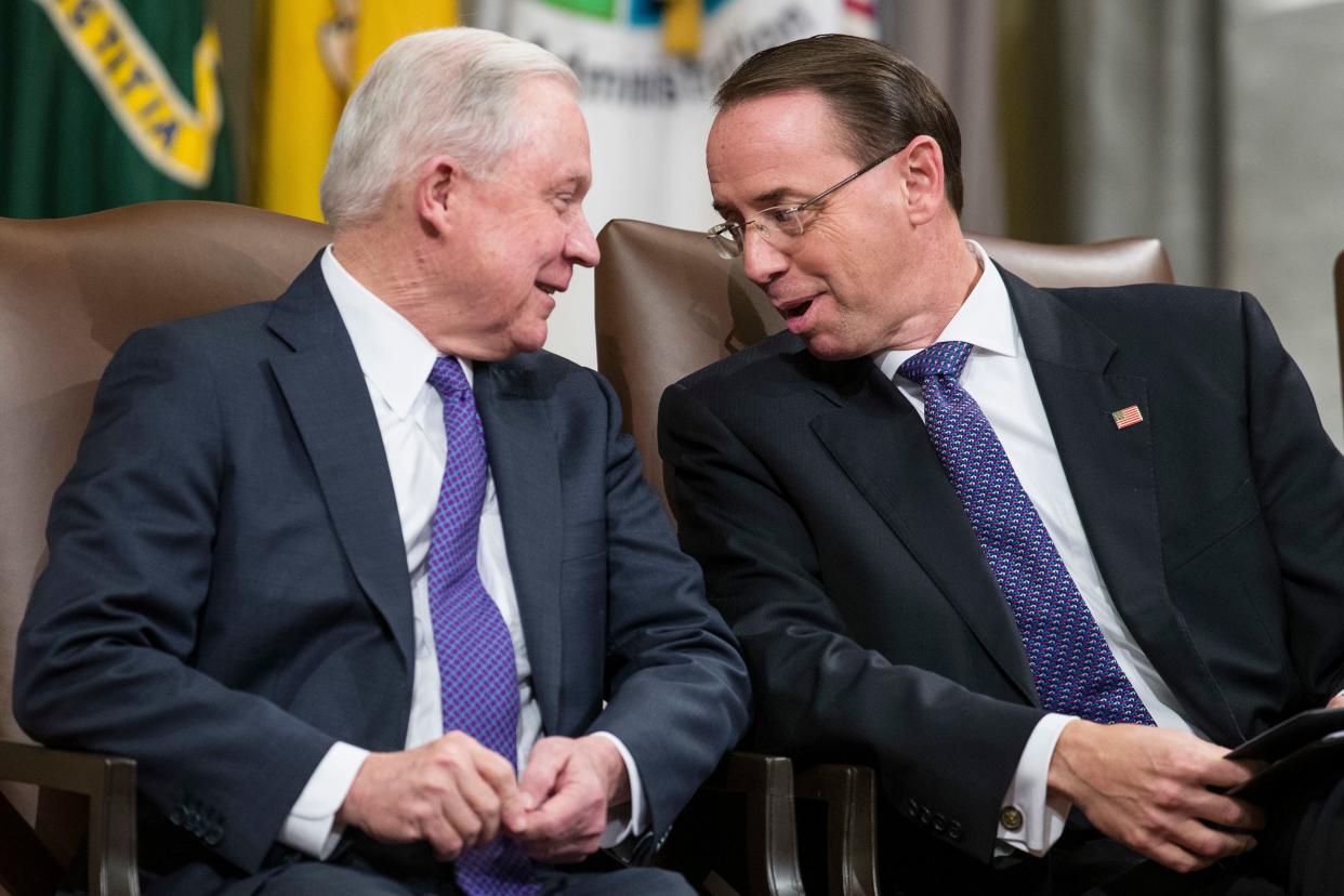 Then-Attorney General Jeff Sessions (left) and then-deputy Attorney General Rod Rosenstein talk during an event in Washington in 2018. Sessions was a top advocate of the family-separation policy during the Trump administration. (AP Photo/Alex Brandon) (Photo: AP Photo/Alex Brandon)