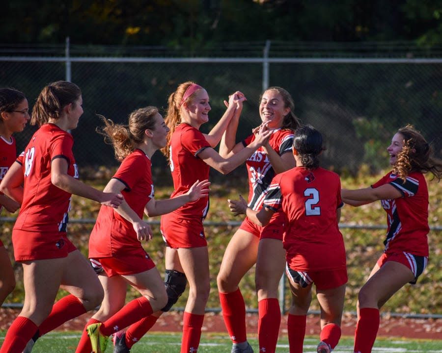 Pocono Mountain East soccer players celebrate teammate Campbell Demarest's goal against Stroudsburg in Swiftwater on Wednesday, Oct. 28, 2021. East won in penalty kicks after a 2-2 tie.