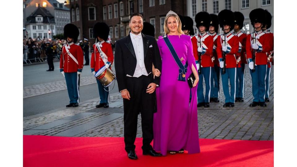 Princess Theodora in magenta gown with matthew kumar in tails