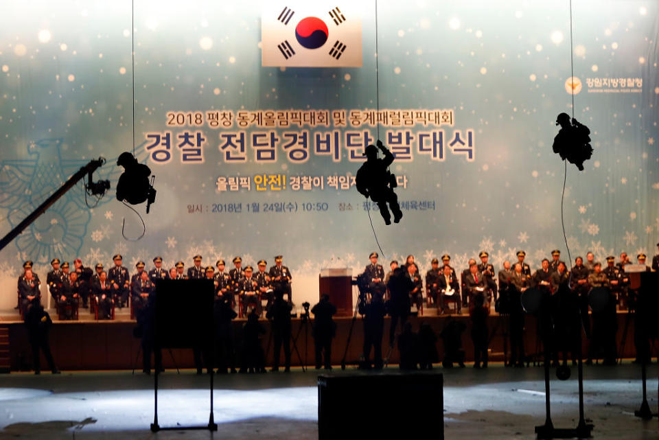 A South Korean SWAT team performs a training exercise ahead of the opening ceremony of the Winter Olympics (Picture: Getty)