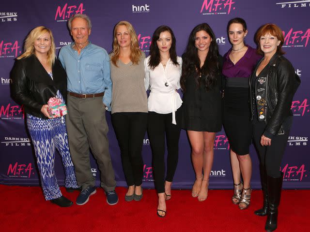 <p>Tasia Wells/Getty</p> Kathryn Eastwood, Clint Eastwood, Alison Eastwood, Francesca Eastwood, Morgan Eastwood and Francis Fisher at the premiere of Dark Sky Films' "M.F.A." on October 2, 2017 in West Hollywood, California.