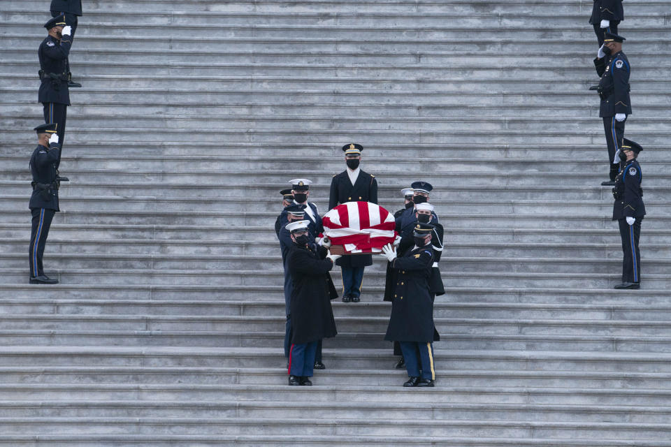 A U.S. Joint Forces bearer team carries the flag-draped casket of former Senate Majority Leader Harry Reid, D-Nev., out of the U.S. Capitol after he lied in state, Wednesday, Jan. 12, 2022, in Washington. (Sarah Silbiger/Pool via AP