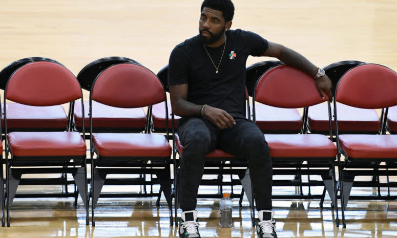 Kyrie Irving sitting by himself during USA basketball practice.