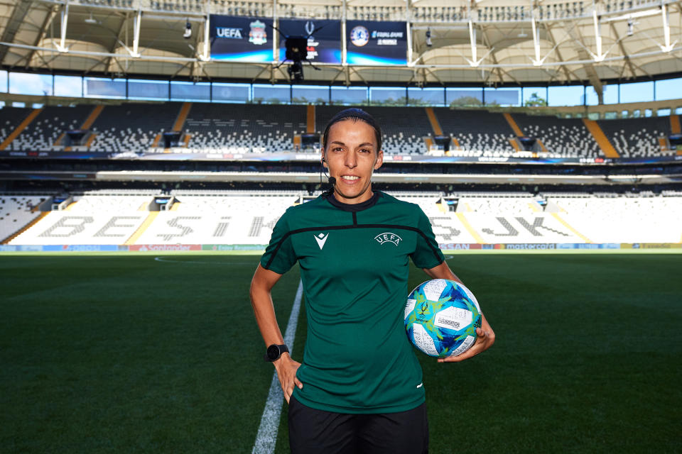 ISTANBUL, TURKEY - AUGUST 13: Main referee Stephanie Frappart of France poses with the official match ball before a training session ahead of UEFA Super Cup Final at Besiktas Park on August 13, 2019 in Istanbul, Turkey. (Photo by Alex Caparros - UEFA/UEFA via Getty Images)