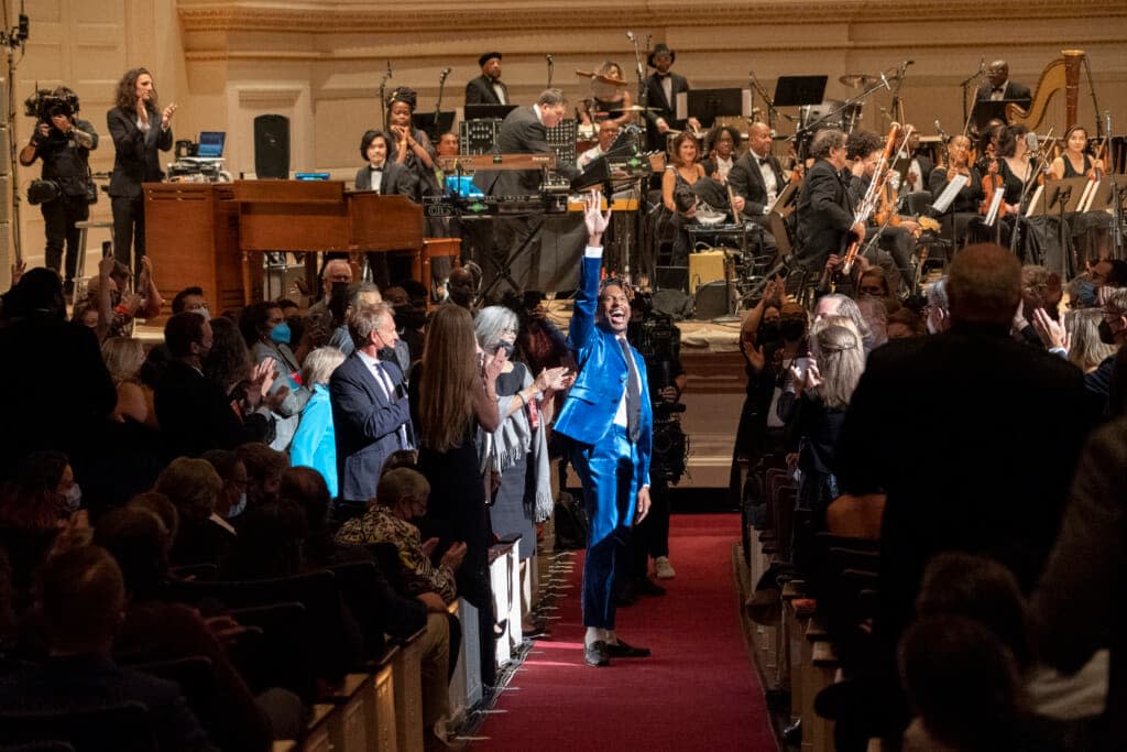 Jon Batiste at the start of his “American Symphony” concert on Sept. 22, 2022 at Carnegie Hall in New York City. Photo credit: Stephanie Berger