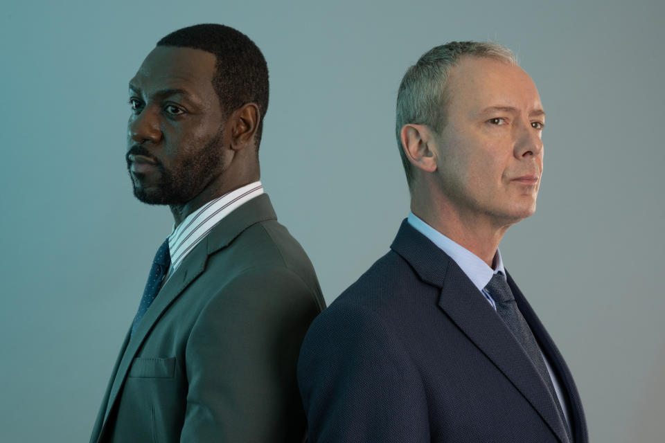 ITV STUDIOS

ITV1 

GRACE SERIES 3
DEAD LIKE YOU

Pictured: JOHN SIMM as DS Roy Grace and RICHIE CAMPBELL as DS Branson.

This photograph is (C) ITV Plc and can only be reproduced for editorial purposes directly in connection with the programme or event mentioned above, or ITV plc. This photograph must not be manipulated [excluding basic cropping] in a manner which alters the visual appearance of the person photographed deemed detrimental or inappropriate by ITV plc Picture Desk.  This photograph must not be syndicated to any other company, publication or website, or permanently archived, without the express written permission of ITV Picture Desk. Full Terms and conditions are available on the website www.itv.com/presscentre/itvpictures/terms

For further information please contact:
patrtick.smith@itv.com