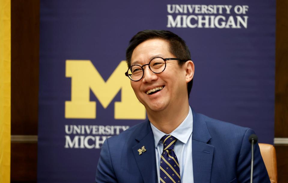 Dr. Santa Ono, the new president of the University of Michigan laughs at a joke regent Mark Bernstein told during a U of M Board of Regents meeting at the Ruthven Building at the Ann Arbor campus on July 13, 2022.