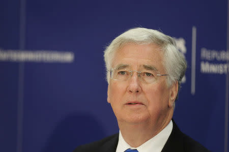 Britain's Defence Secretary Michael Fallon speaks during a press conference after the official ceremony welcoming the deployment of a multi-national NATO battalion in Tapa, Estonia, April 20, 2017. REUTERS/Ints Kalnins