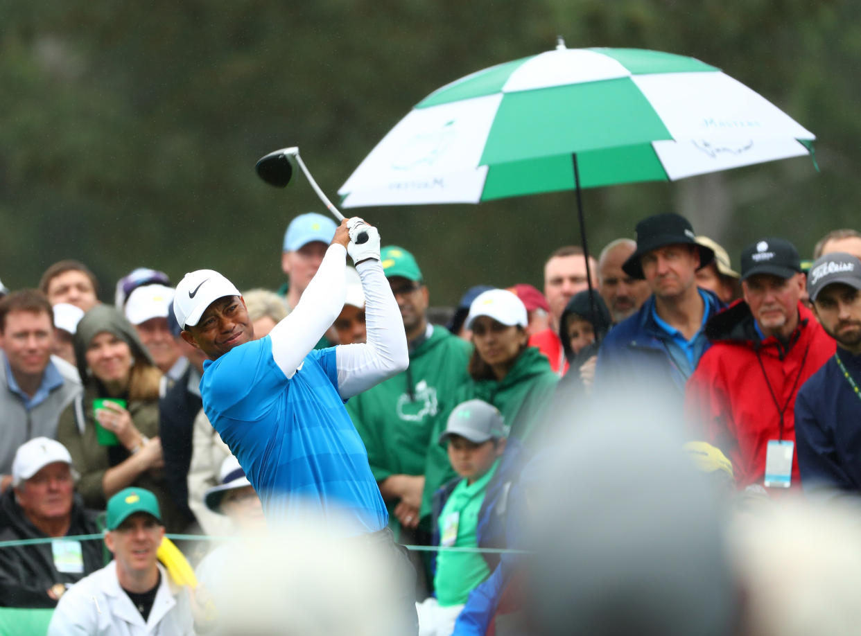 Apr 7, 2018; Augusta, GA, USA; Tiger Woods hits his tee shot on the 8th hole during the third round of the Masters golf tournament at Augusta National Golf Club. Mandatory Credit: Rob Schumacher-USA TODAY Sports