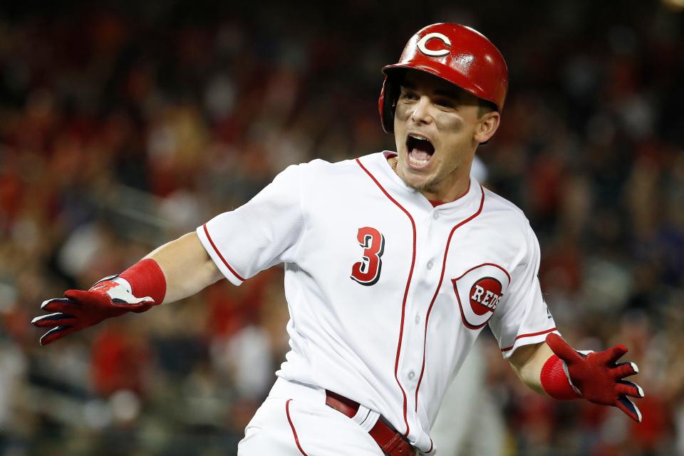 Cincinnati Reds Scooter Gennett (3) celebrates his two-run homer in the ninth inning during the Major League Baseball All-star Game, Tuesday, July 17, 2018 in Washington. (AP Photo/Alex Brandon)