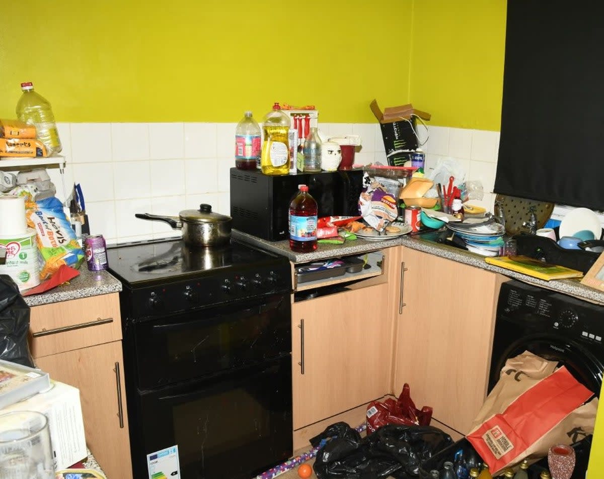 The kitchen was also filled with clutter and rubbish (West Midlands Police)