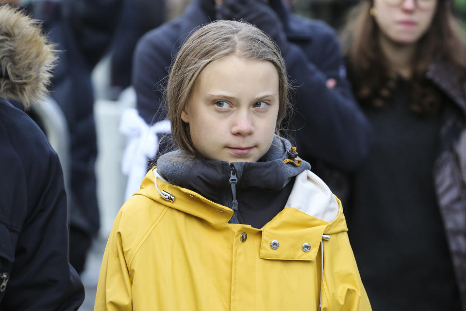 16-year-old Swedish climate change activist, Greta Thunberg takes part in the Fridays For Future rally in Piazza Castello on December 13, 2019, in Turin, Italy  - Thunberg rose to international prominence last August for organising the first 'School strike for climate', also known as Fridays For Future, a global movement of school students who swap classes for demonstrations to demand action to prevent further global warming and climate change. (Photo by Massimiliano Ferraro/NurPhoto via Getty Images)