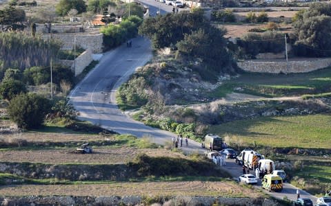 Investigative journalist Daphne Caruana Galizia was killed by a bomb in her car in October last year - Credit:  AP