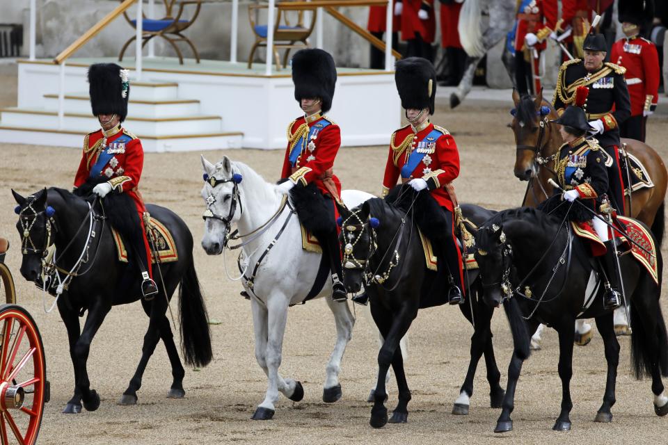 (L-R) Britain's Prince Charles, Prince of Wales, Britain's Prince William, Duke of Cambridge, Britain's Prince Andrew, Duke of York, and Britain's Princess Anne, Princess Royal on horseback follow Britain's Queen Elizabeth II in a horse-drawn carriage into Horseguards parade ahead of the Queen's Birthday Parade, 'Trooping the Colour', in London on June 8, 2019. - The ceremony of Trooping the Colour is believed to have first been performed during the reign of King Charles II. Since 1748, the Trooping of the Colour has marked the official birthday of the British Sovereign. Over 1400 parading soldiers, almost 300 horses and 400 musicians take part in the event. (Photo by Tolga AKMEN / AFP)        (Photo credit should read TOLGA AKMEN/AFP/Getty Images)