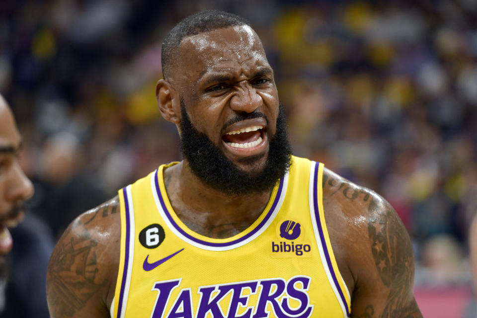Los Angeles Lakers forward LeBron James reacts during the first half of Game 2 of the team's first-round NBA basketball playoff series against the Memphis Grizzlies on Wednesday, April 19, 2023, in Memphis, Tenn. (AP Photo/Brandon Dill)