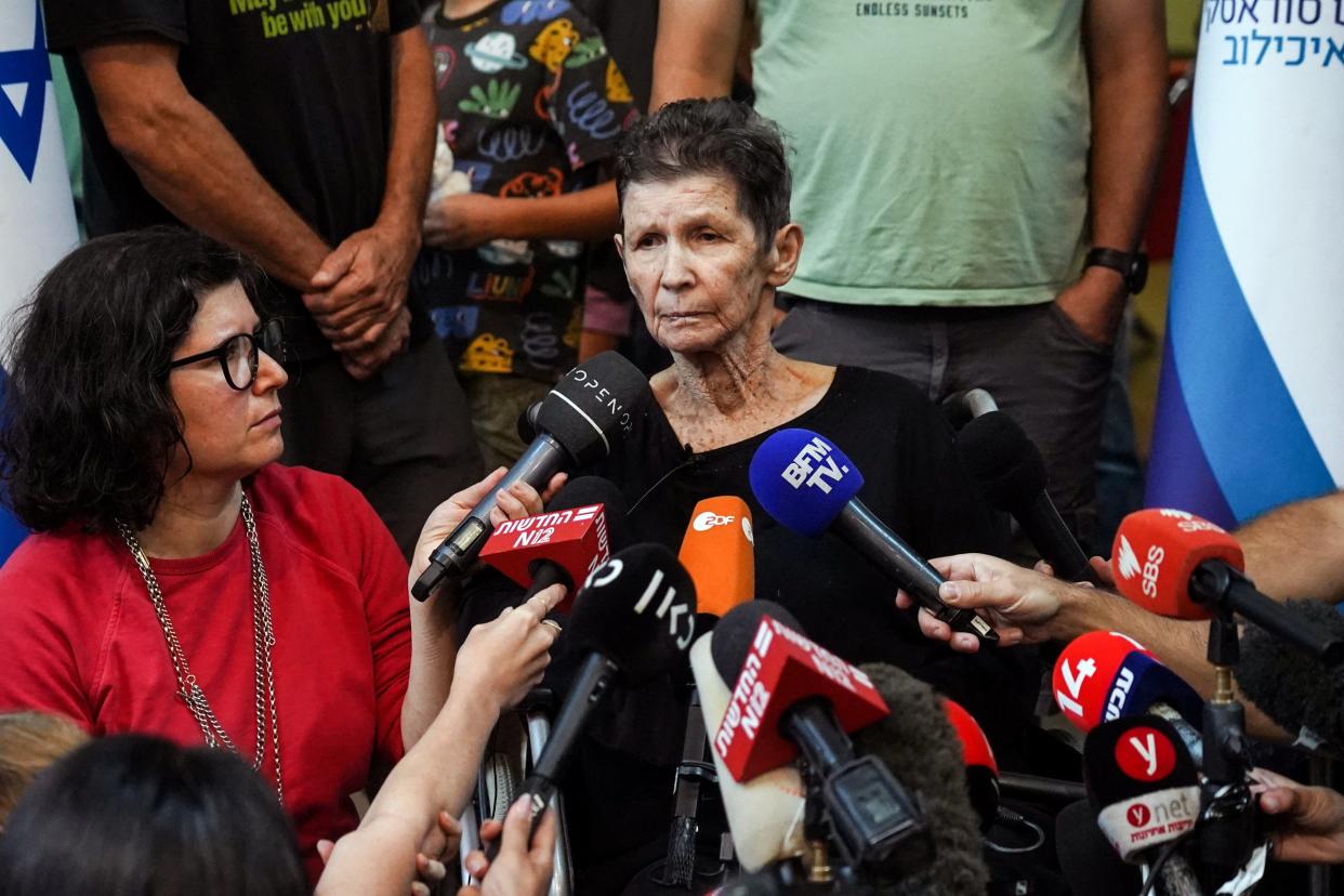 Yocheved Lifshitz, 85, speaking from a hospital in Tel Aviv, her British daughter Sharone Lifschitz beside her (REUTERS)