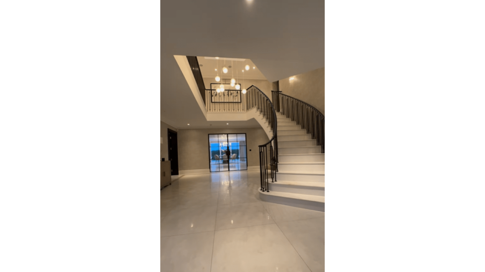 Mark and Michelle's large neutral hallway with stairs