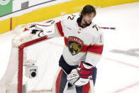 Florida Panthers goaltender Sergei Bobrovsky reacts after losing his face mask during the first period in Game 2 of an NHL hockey Stanley Cup second-round playoff series against the Toronto Maple Leafs in Toronto, Thursday, May 4, 2023. (Frank Gunn/The Canadian Press via AP)