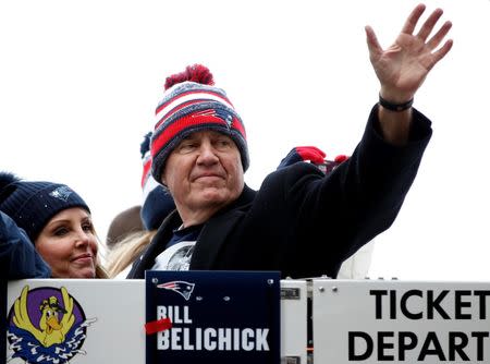 Feb 4, 2015; Boston, MA, USA; New England Patriots head coach Bill Belichick waves to the crowd during the Super Bowl XLIX-New England Patriots Parade. Mandatory Credit: Greg M. Cooper-USA TODAY Sports