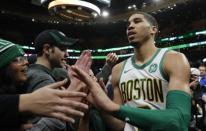 FILE PHOTO: Jan 16, 2019; Boston, MA, USA; Boston Celtics forward Jayson Tatum (0) exits the court after a game against the Toronto Raptors at TD Garden. The Celtics defeated Toronto 117-108. Mandatory Credit: David Butler II-USA TODAY Sports